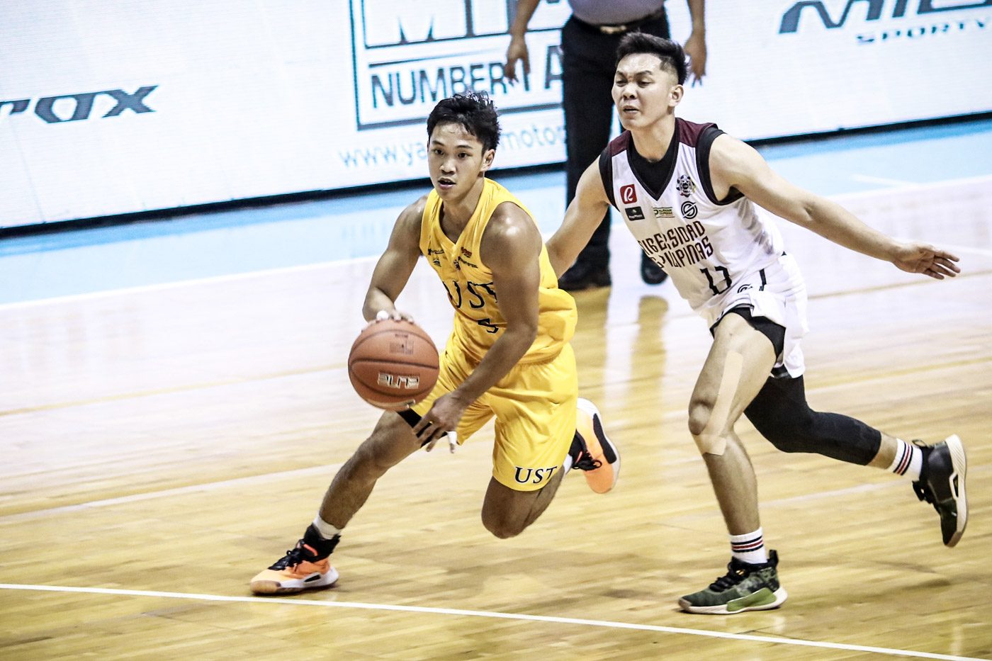 UST Tigers buck Maroons comeback to stay unbeaten