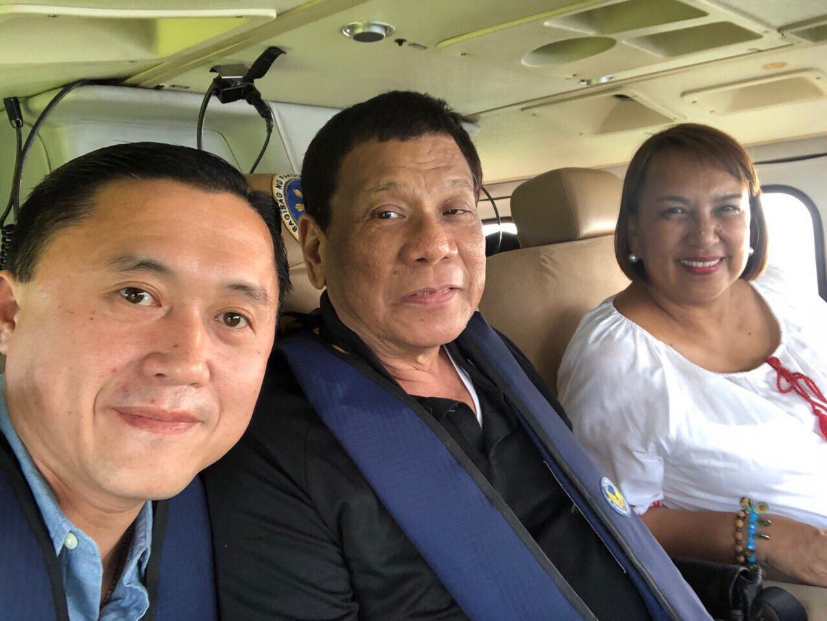 STILL SELFIE-OBSESSED. Senator Bong Go goes with President Duterte to inspect Batanes after the July 27 earthquake, like he would do as special assistant. Photo from Senator Bong Go  