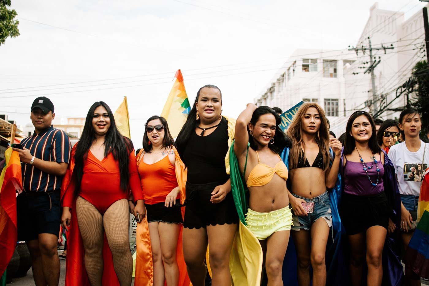 HUMAN RAINBOW. Members of the LGBTQ+ form a human rainbow with their color-coordinated outfits. Photo by Jorge Gamboa 