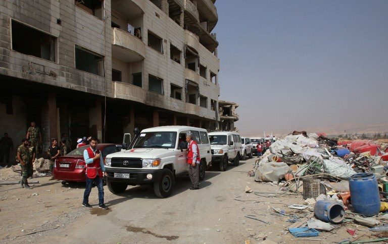 Evacuation begins from Daraya, symbol of Syria revolt