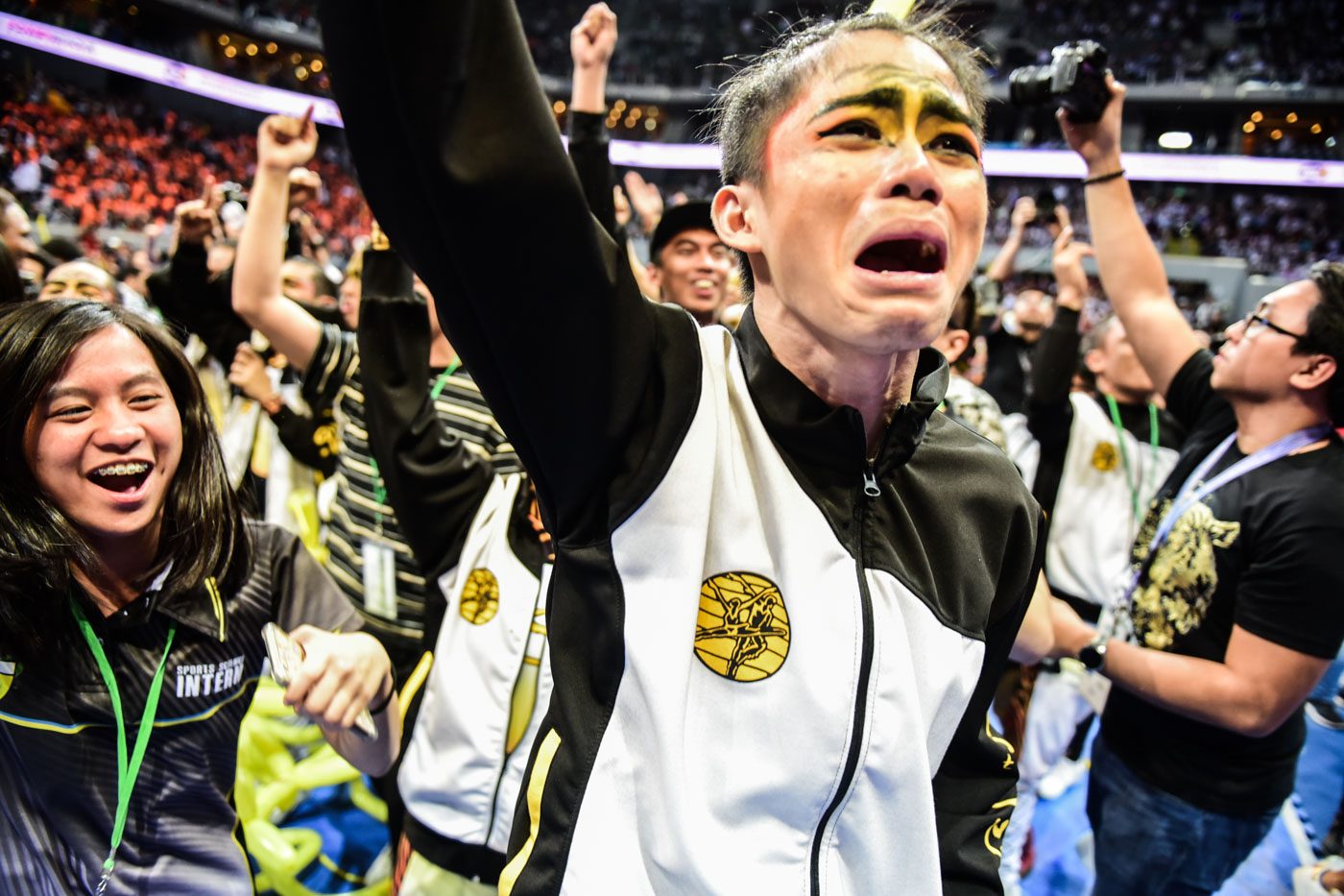 EMOTIONAL. UST finally makes it back to the podium after last year's medal drought. Photo by Alecs Ongcal/Rappler 
