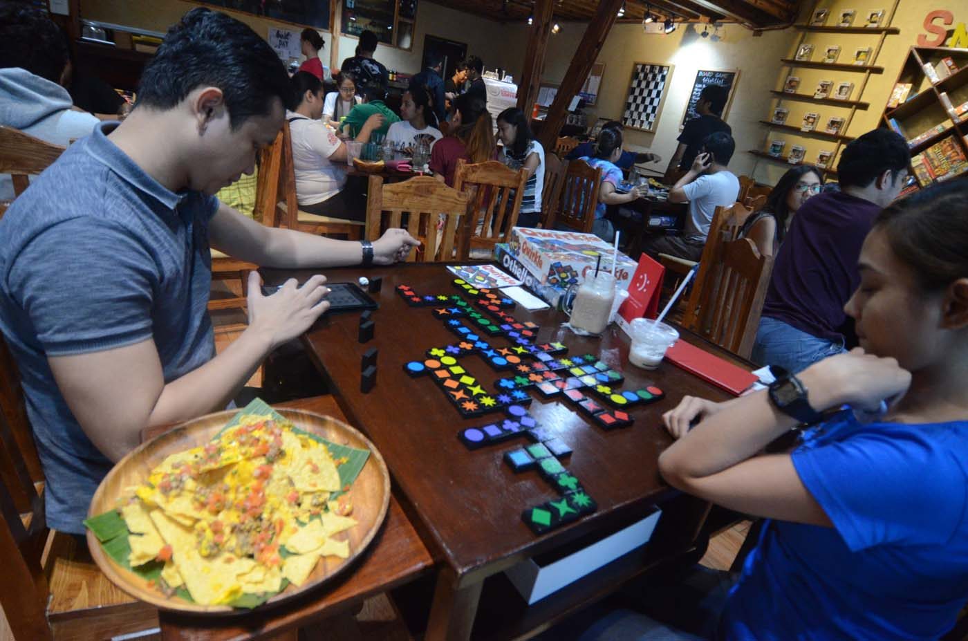 BOARD GAME CAFE. Snacks and Ladders at Maginhawa Street, Quezon City is one of the board game cafes in the Metro. File photo by Alecs Ongcal/Rappler 