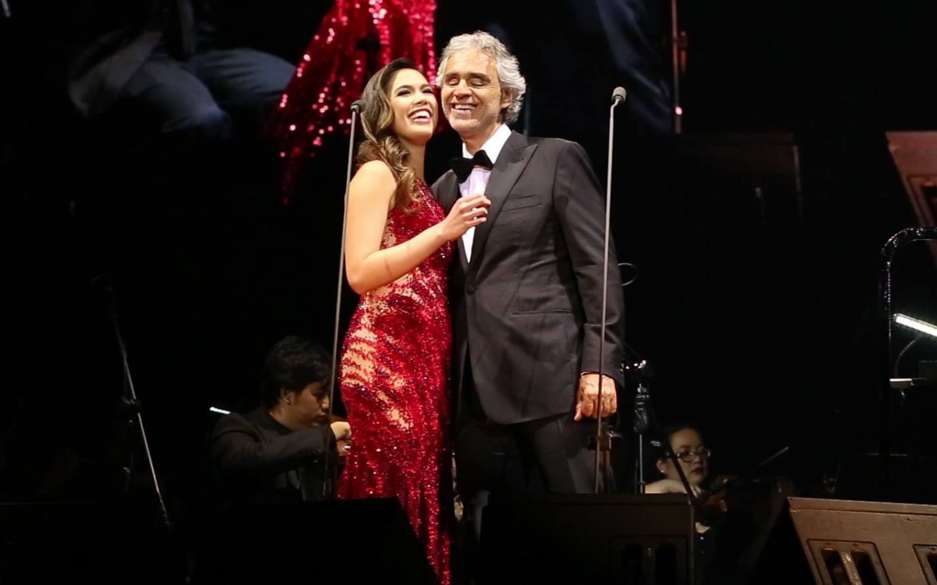 'CHEEK TO CHEEK.' Christine Allado and Andrea Bocelli share a cute moment after they perform a duet of his song 'Cheek to Cheek' at his Manila concert. Photo by Photo by Roberto Vivancos Studio www.robertovivancos.com 