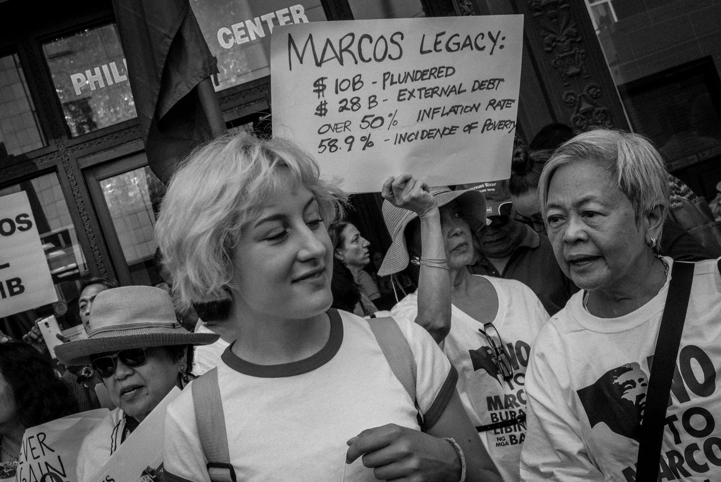 MOTHERS AND DAUGHTERS. Lorena (L), 17- year old daughter of Melinda Paras, who was named after Lorena Barrios, joined the protest together with Leni Marin and Thelma King. Photo by Rick Rocamora   