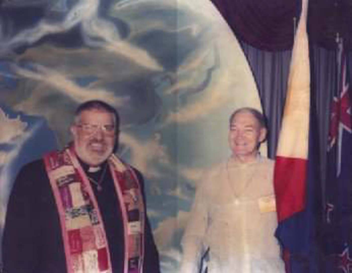 FOUNDING OF MCC MANILA. Father Richard Mickley (right) holding the flag of the Philippines with Reverend Troy Perry, founder of MCC worldwide. Photo courtesy of Father Richard Mickley   