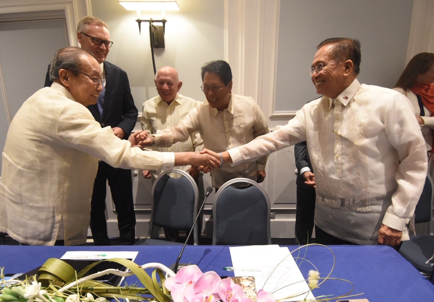 BRINGING JOMA HOME. Peace Process Adviser Jesus Dureza shakes hands with CPP founder Jose Maria Sison in Rome. Photo from OPAPP 