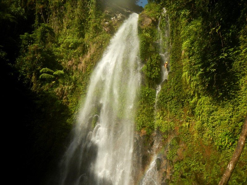 ULAN-ULAN FALLS. These towering lush falls can be enjoyed at the bottom via less than an hour's trek or via canyoneering. Photo courtesy of Sheilamei Abellanoza and Gian Carlo Jubela  