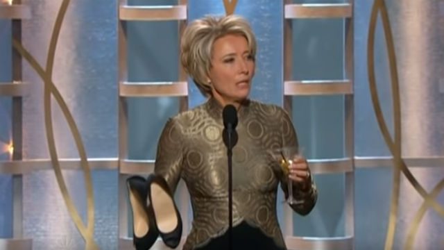 SHOES OFF. Actress Emma Thmpson holds her shoes and a drink during the Golden Globes 2014 ceremony. Screenshot from YouTube/OMGC+ 