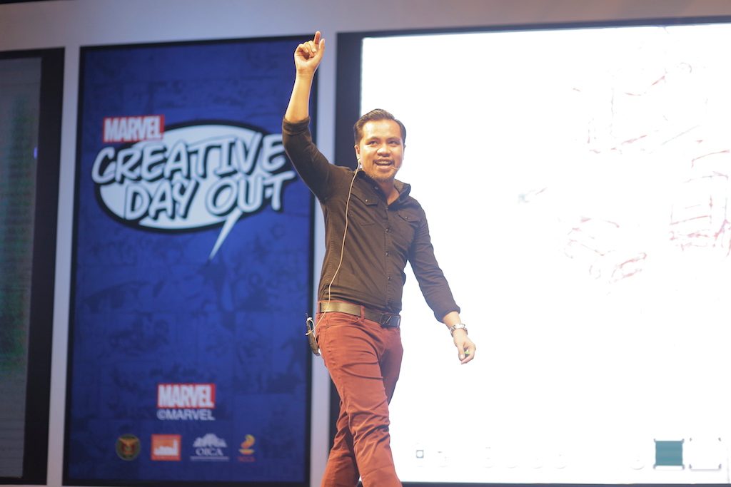 PINOY PRIDE. Filipino Marvel penciler Harvey Tolibao lets people in on how to succeed as a comic artist. Photo courtesy of Marvel Creative Day Out 