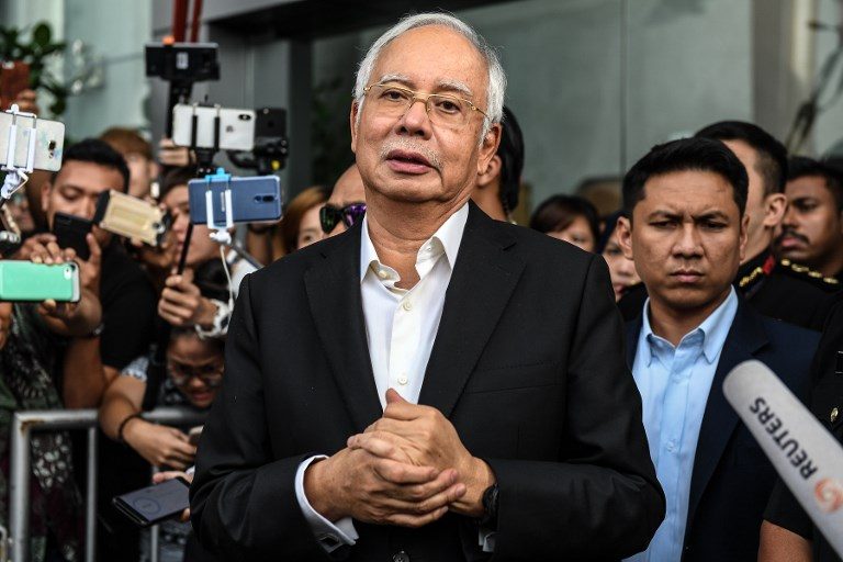 Malaysia ex-PM hit with 25 new charges over 1MDB scandal