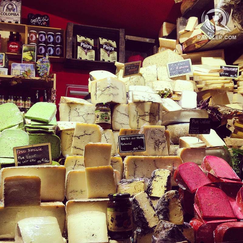 FROMAGE. Christmas markets get cheesy, quite literally. Blocks and blocks of cheese, all different kinds from France and neighboring countries like Switzerland and Italy. Photo by Ana Santos 