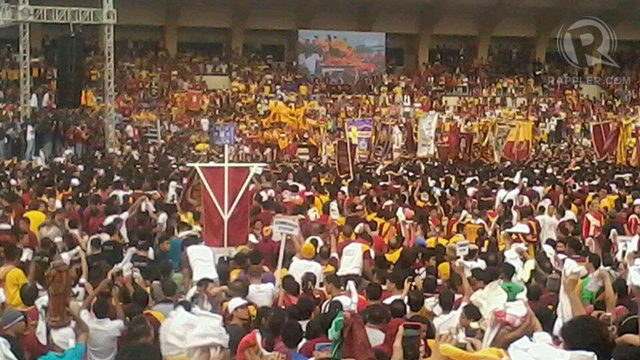 Thousands of devotees attend a Mass, celebrated by Manila Archbishop Luis Antonio Cardinal Tagle, at the Quirino Grandstand as part of the Feast of the Black Nazarene, January 9, 2013. 