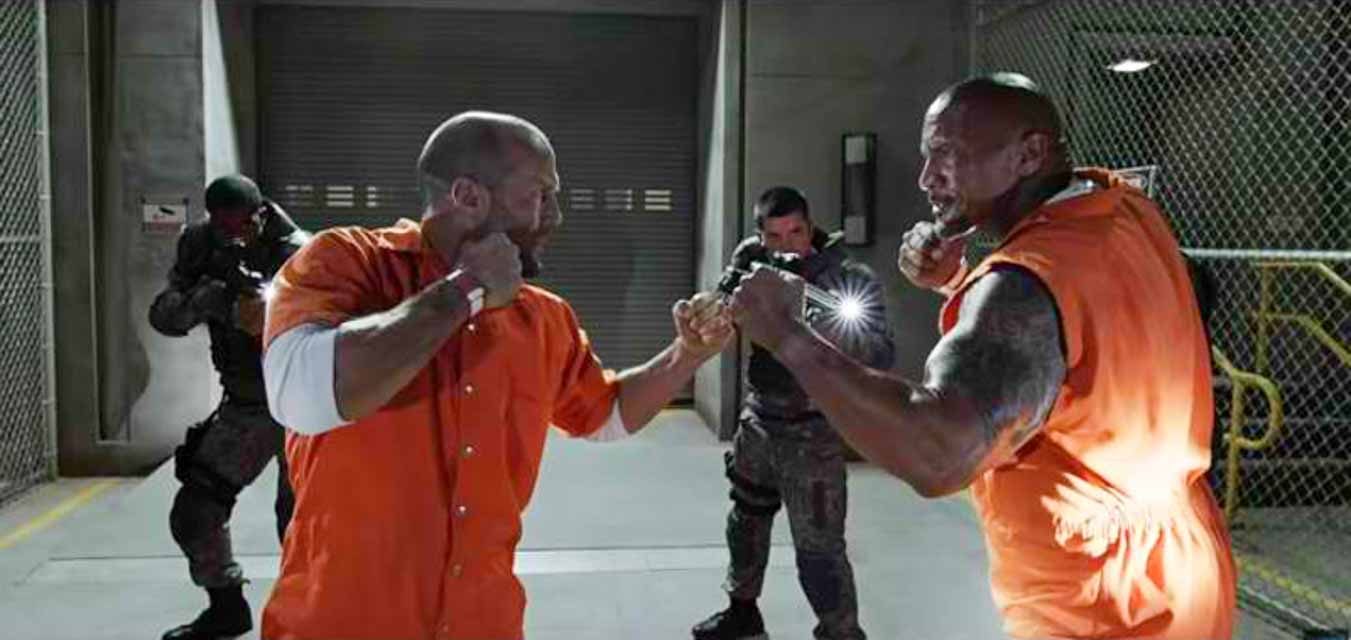 Jason Statham and Dwayne Johnson in a scene from 'Fast and Furious 8.' Photo courtesy of Columbia Pictures  