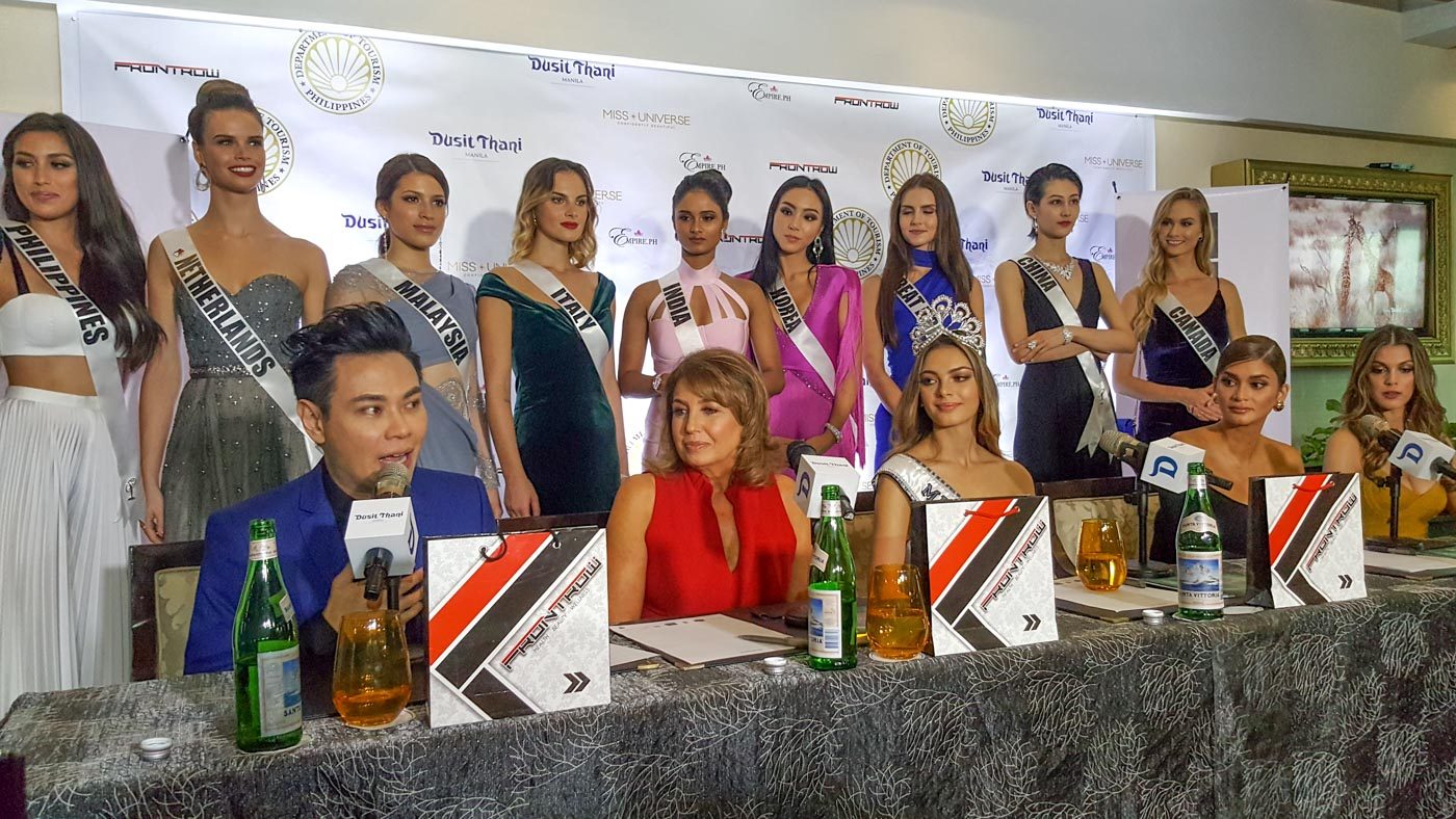 ALL TOGETHER. RS Francisco (left, seated) and Pia Wurtzbach attend the press conference at the Dusit Thani with the candidates. Photo by Alexa Villano/Rappler  