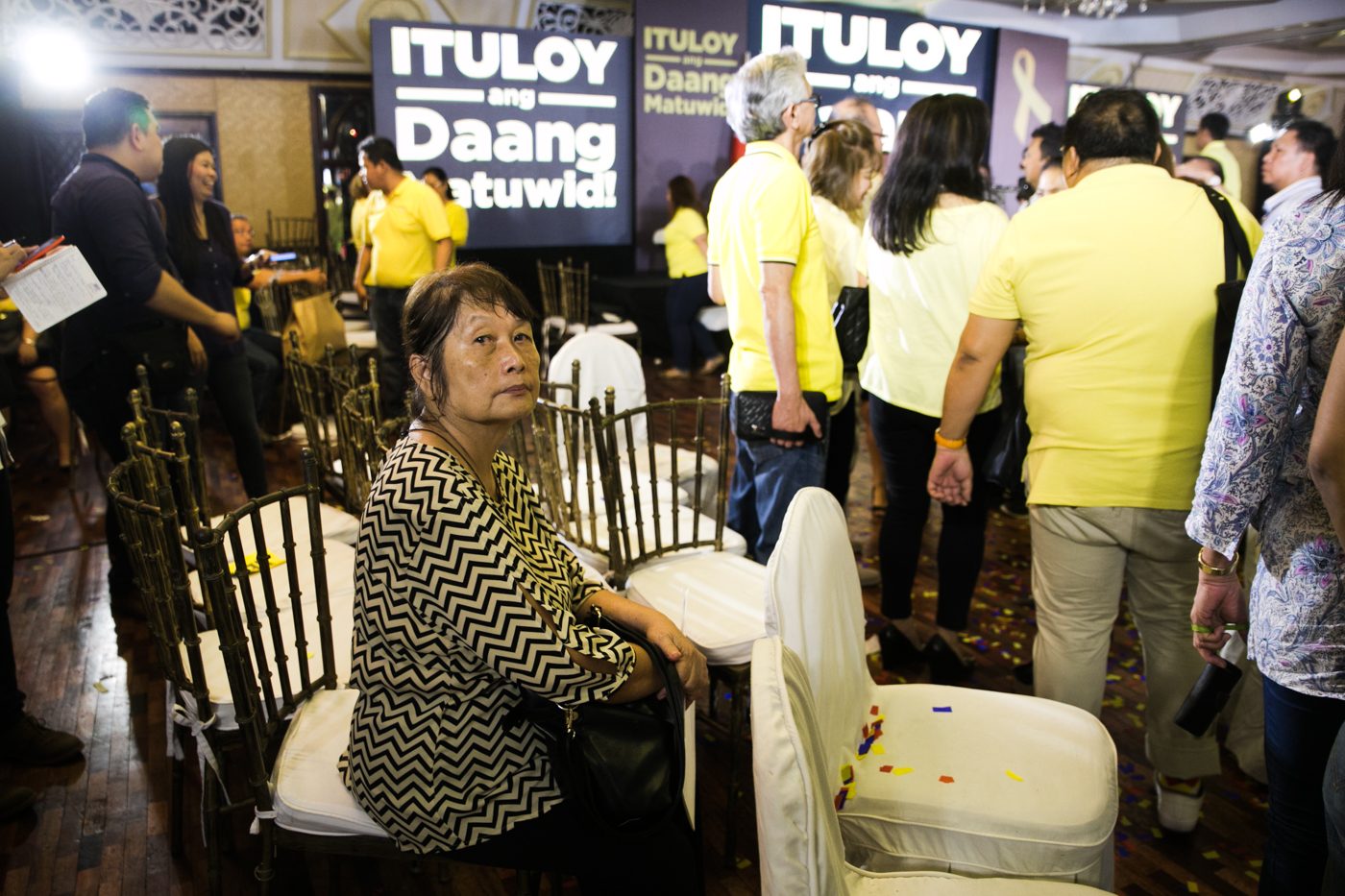 LONG WAY. Lilia Villas, a retired teacher, came all the way from Bulacan to see Mar Roxas.  Photo by Pat Nabong/Rappler  
