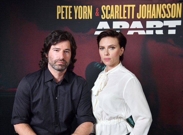 APART. Pete Yorn and Scarlett Johansson pose for a picture as they announce the launch of their new extended play record 'Apart' on May 22 in New York City. Their EP came out on June 1. Photo by Angela Weiss/ / AFP  