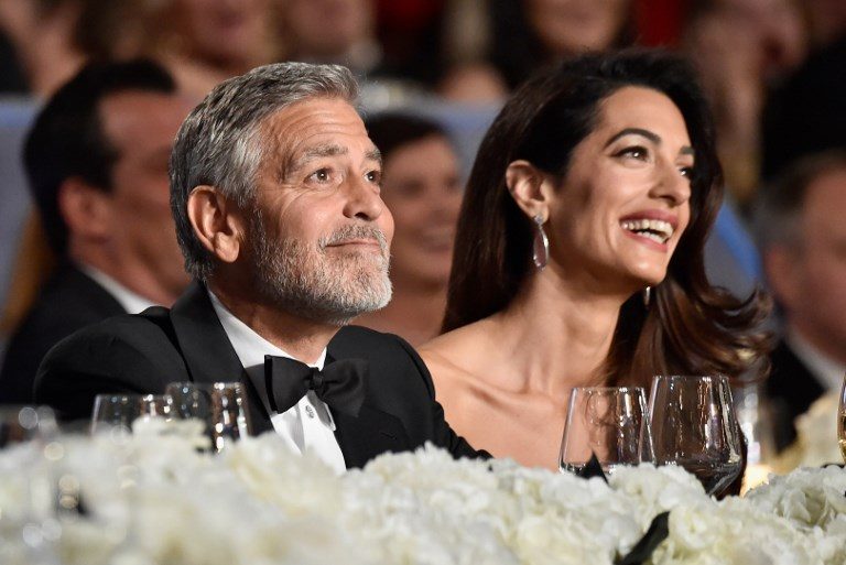 Clooneys open wallets as celebrities attack family separations