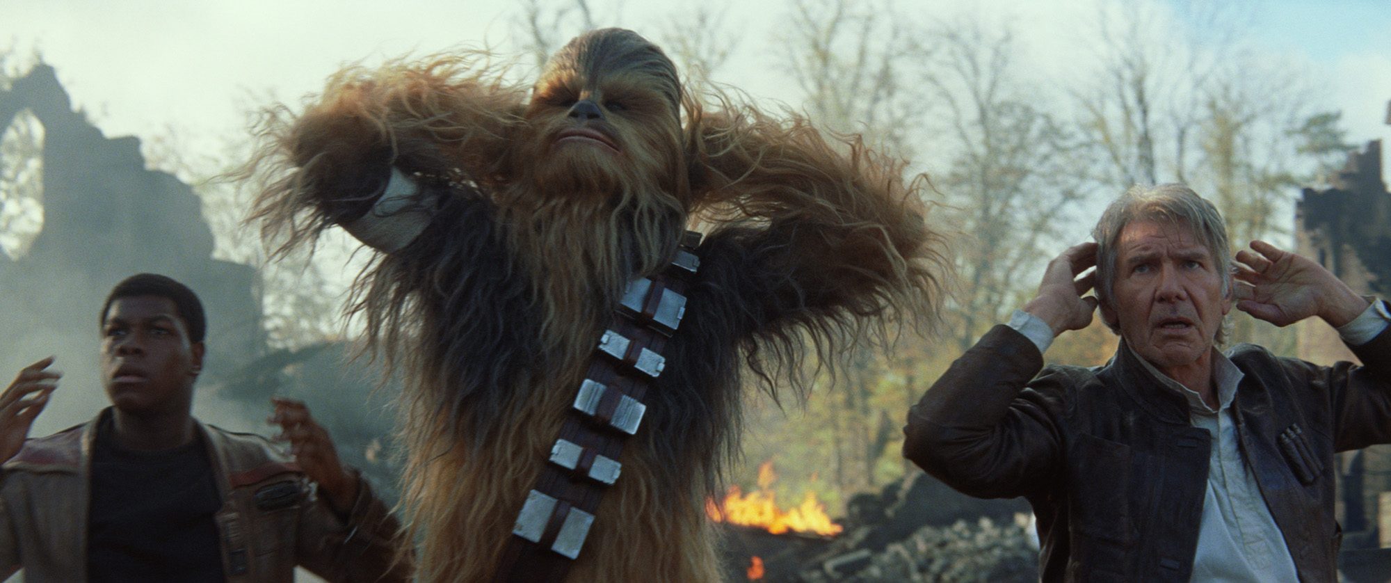 FAN SERVICE. Finn (John Boyega), Chewbacca, and Han Solo (Harrison Ford) in 'Star Wars: The Force Awakens.' Photo courtesy of Disney 