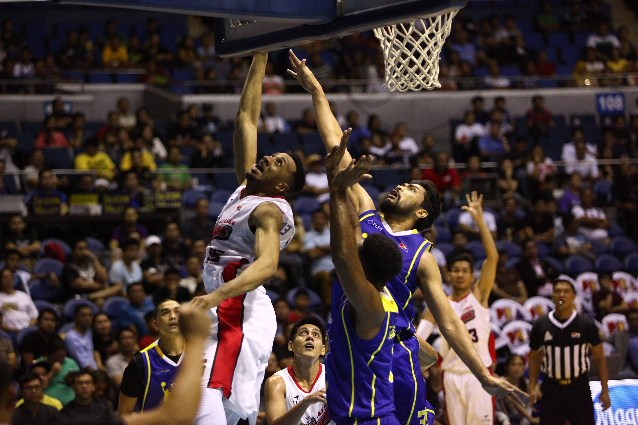 Edwards debuts with 36 to lead Alaska past TNT