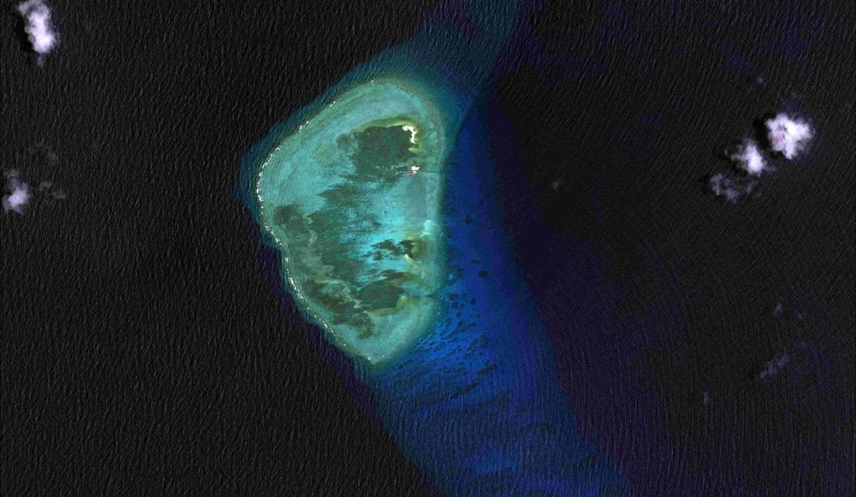 GAVEN/BURGOS REEF. Was just a rock in 2007. On March 2015 (below) a Chinese facility is seen constructed. 