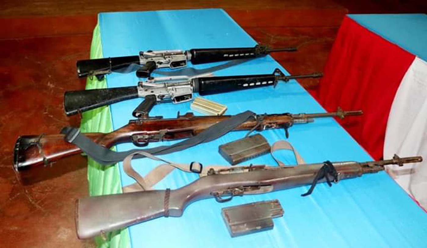 FIREARMS. The firearms surrendered by the suspects include two M16A1 rifles, a M14 US rifle, and a M1 US carbine with several magazines and ammunitions. Photo courtesy of 4th Special Forces Batallion  
