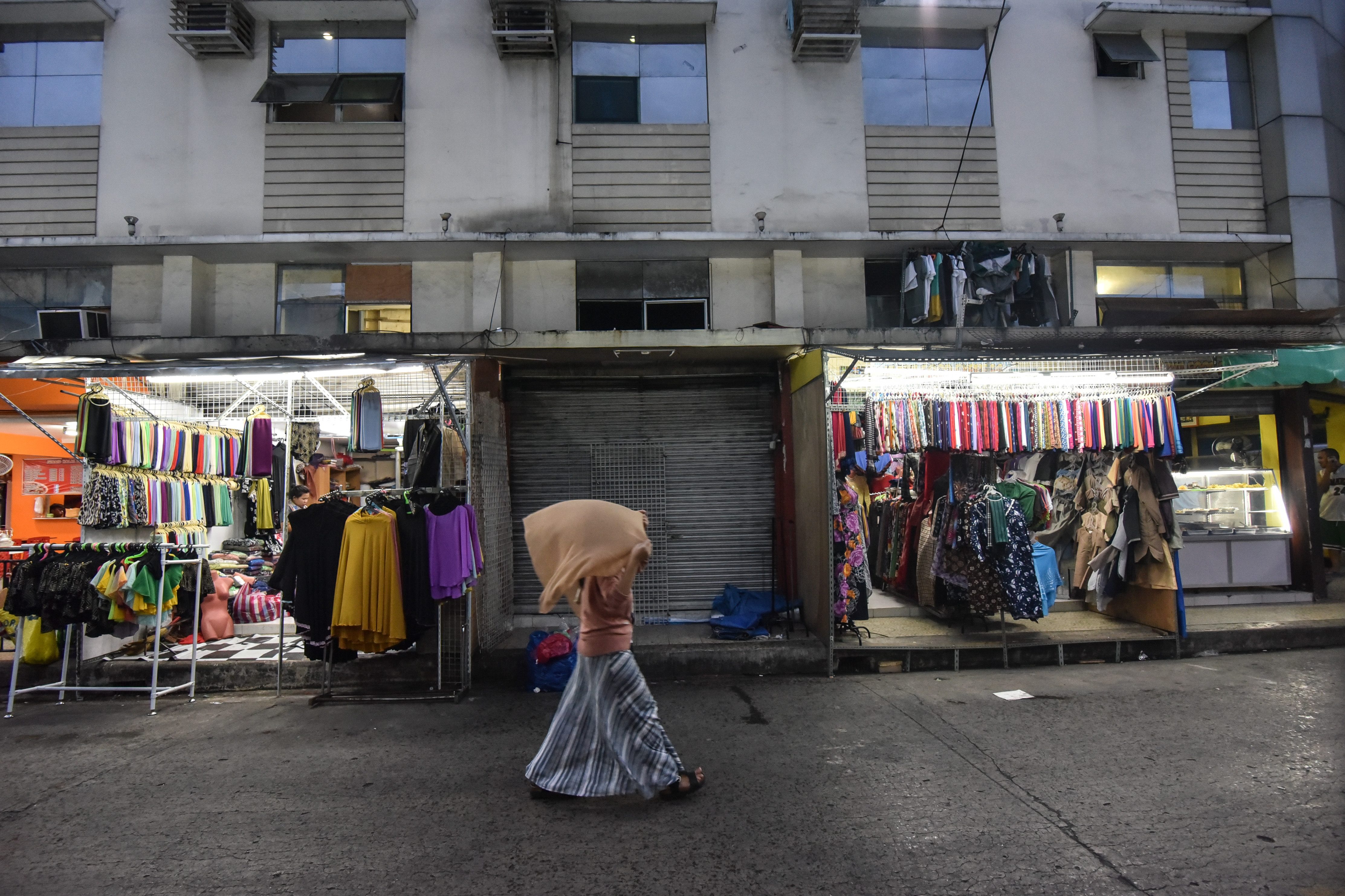 BACK IN BUSINESS. Neighboring stalls open their businesses just in time for Ramadan while the office of imam Nasser Abinal remained closed after a twin explosion struck it on May 6, 2017. 
