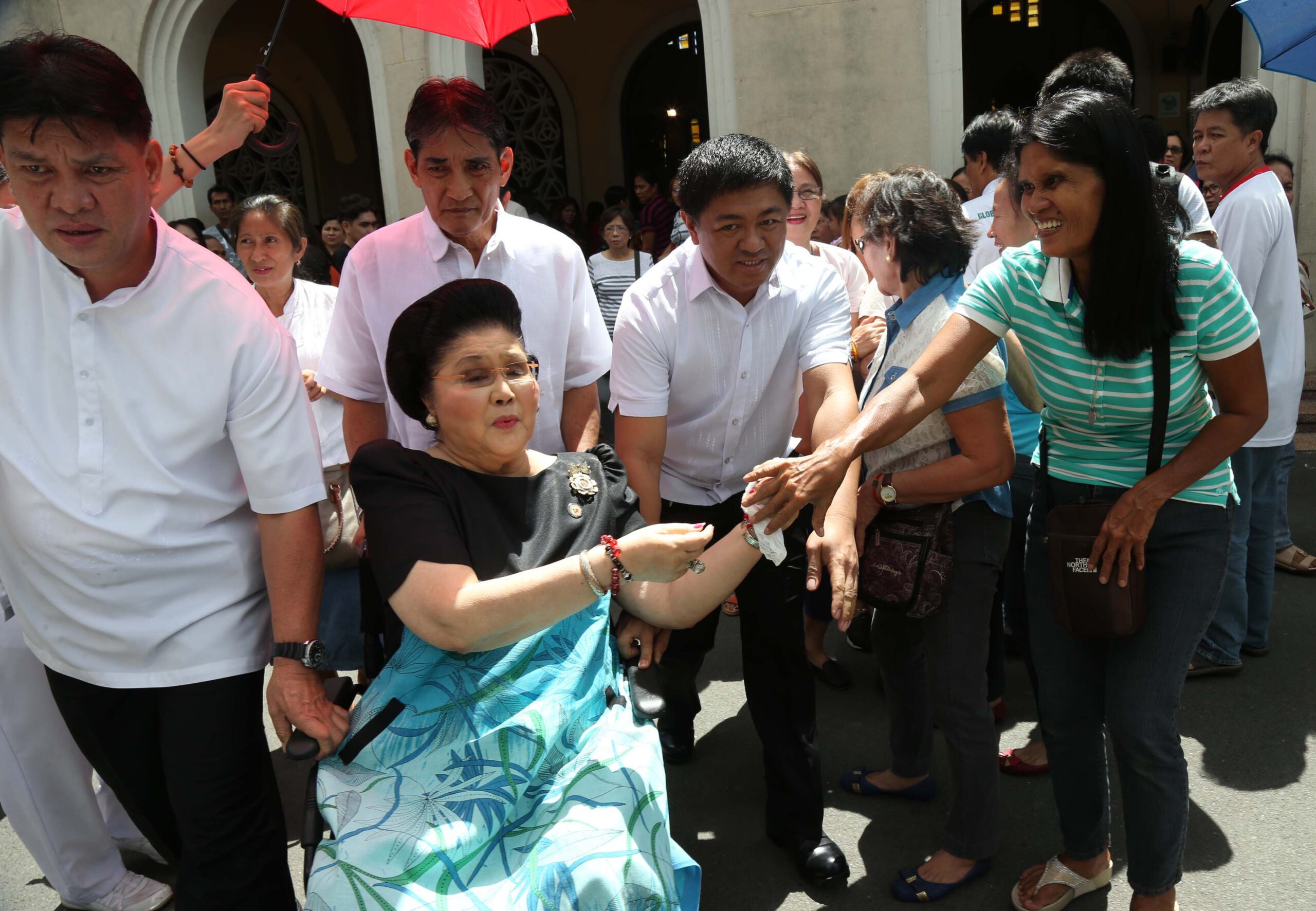 Imelda Marcos sits through Mass for victims of husband’s regime