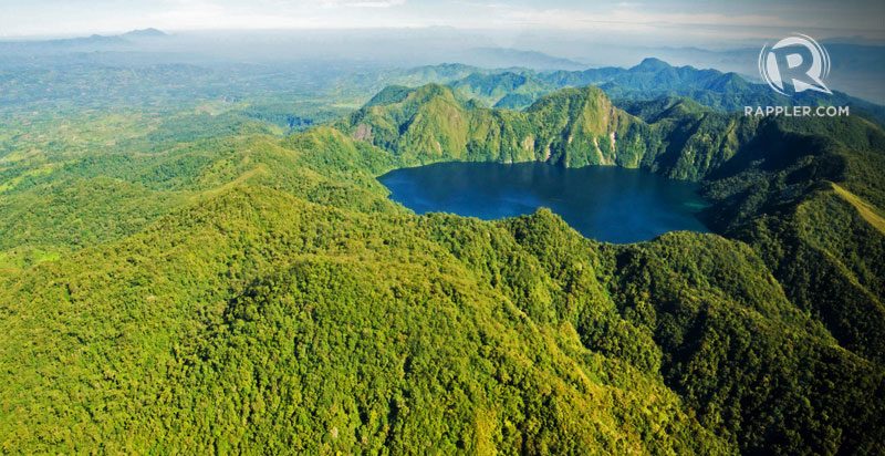 FROM ABOVE. Mt. Melibingoy’s lake and rainforests make a vivid blue and green. Photo by Louie Pacardo