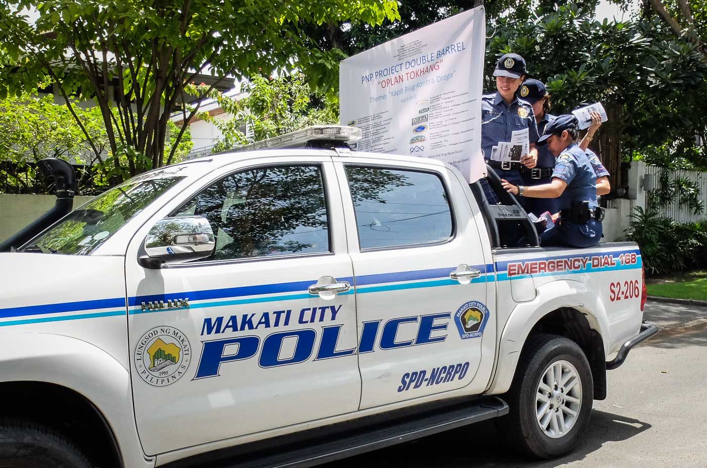 ON DUTY. Some female police officers ride their vehicle as they conduct Oplan TokHang in Forbes Park on September 5, 2016. Photo by LeAnne Jazul/Rappler 