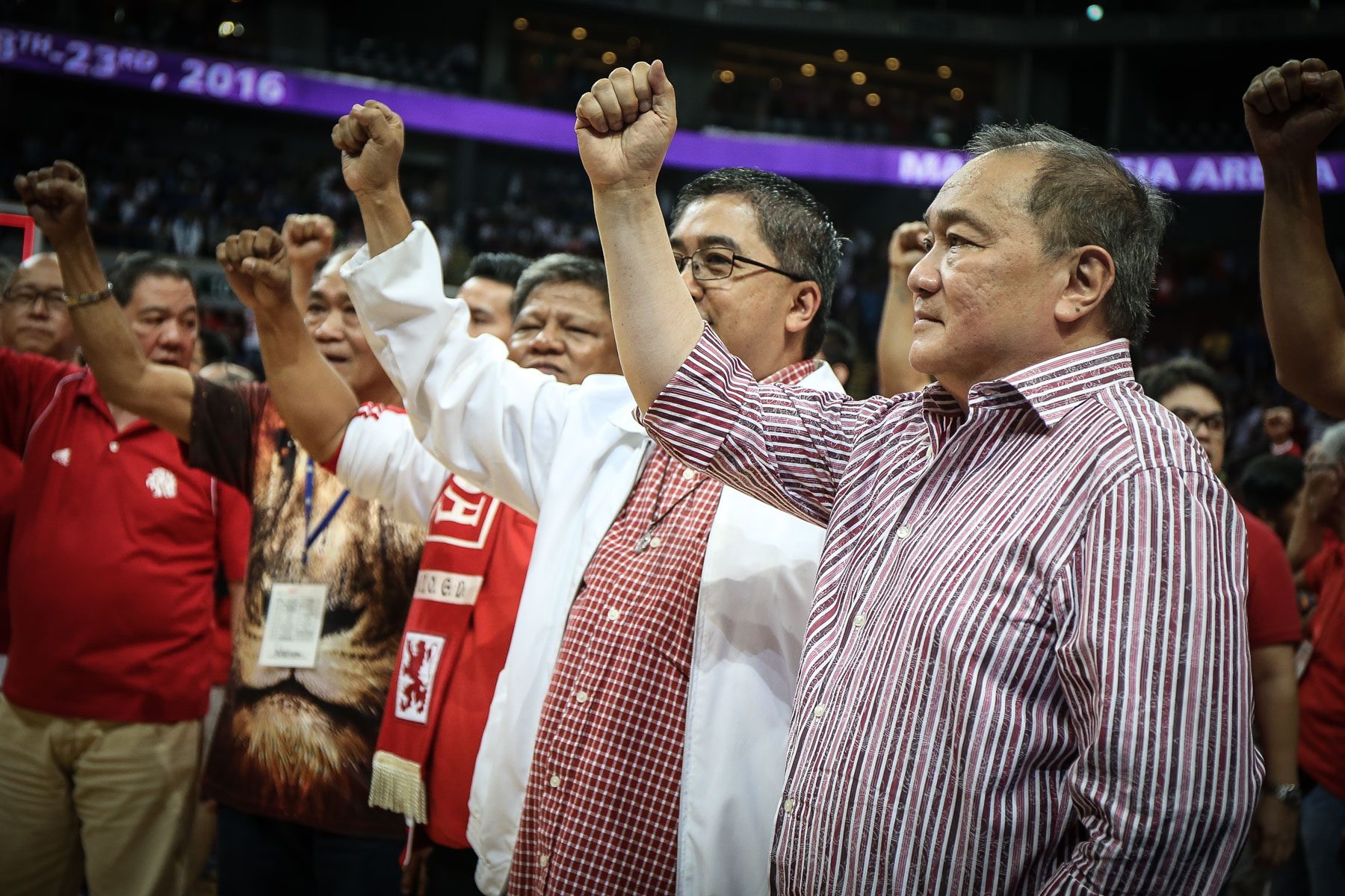 MVP. San Beda basketball patron Manny V. Pangilinan sings the hymn and celebrates with the Red Lions on the court. Photo by Josh Albelda/Rappler 
