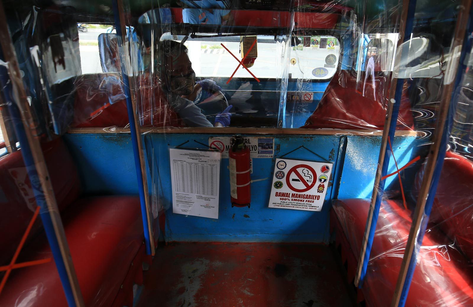 RESUME OPERATIONS. Foot bath, face mask and plastic covers, these are what jeepney drivers are preparing at their terminal in Pasay City. Photo by Inoue Jaena/Rappler 