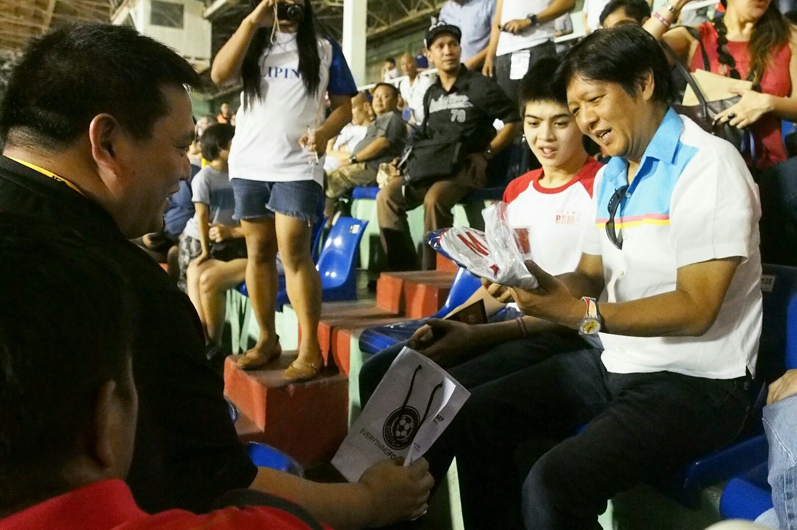 AZKALS' NO. 10. Vice presidential candidate Senator Ferdinand 'Bongbong' Marcos Jr receives the No. 10 Azkals jersey from team manager Dan Palami during Tuesday night's game between the Philippines and North Korea. Photo from the Office of Senator Bongbong Marcos   
