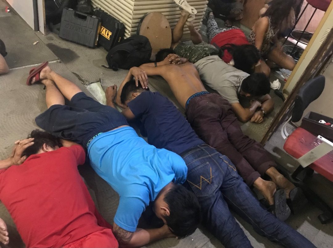 Makati police arrest 12 in drug den raid