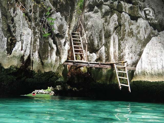 PASSAGE TO THE NEXT LAGOON. During low tide, you can swim through the opening under the rock, while on high tide you can climb the ladder to get to the other side 