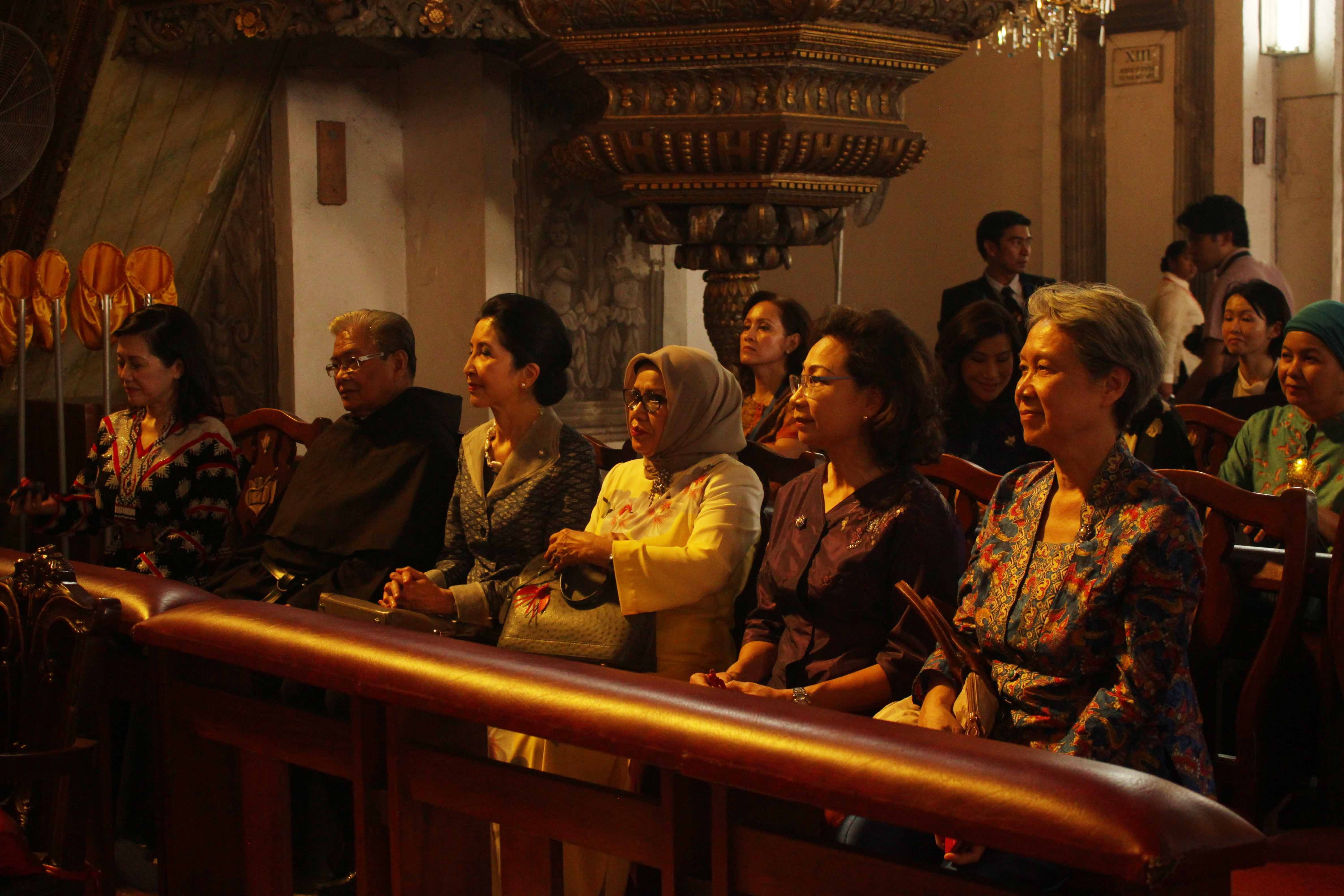 SACRED MUSIC. In this photo, spouses listen to the Hail Mary the Queen Children's Choir.