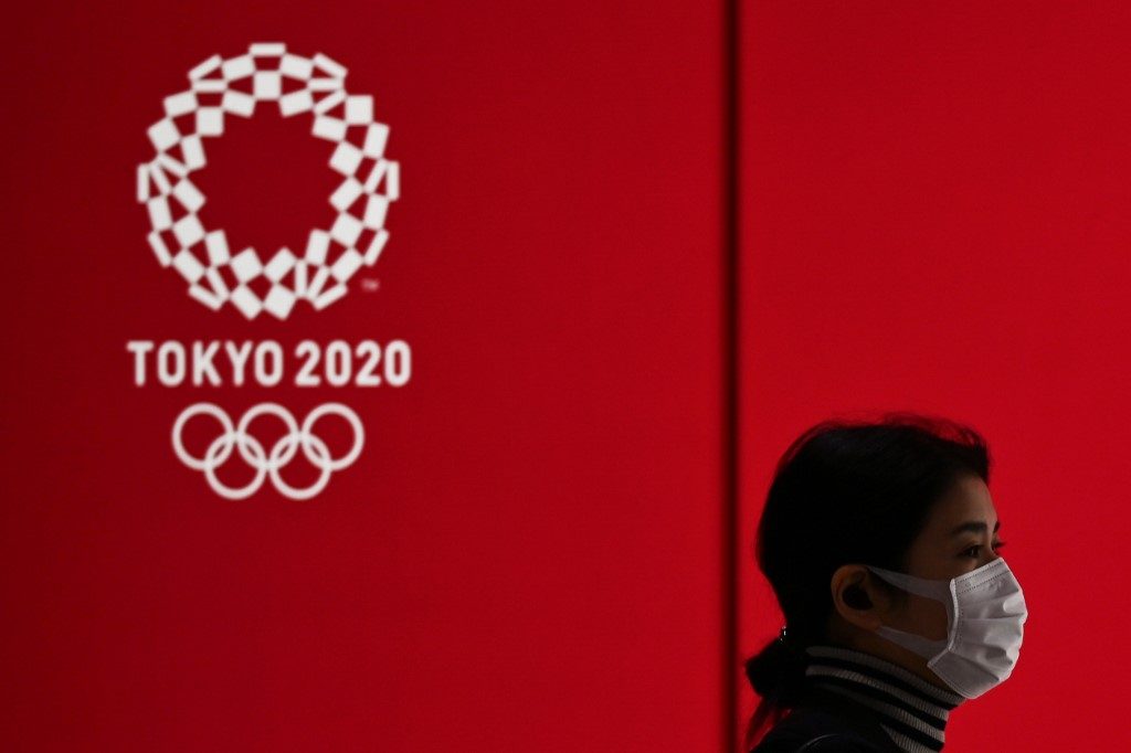 Tokyo begins Olympic task of reorganizing Games