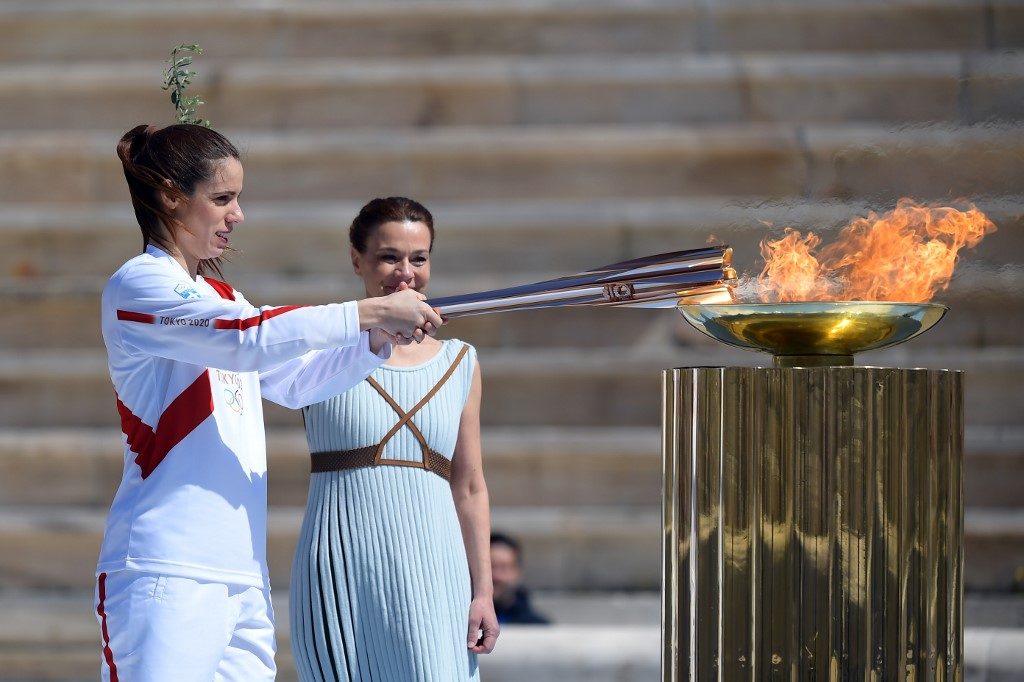 Greece hands over Olympic flame to Tokyo 2020