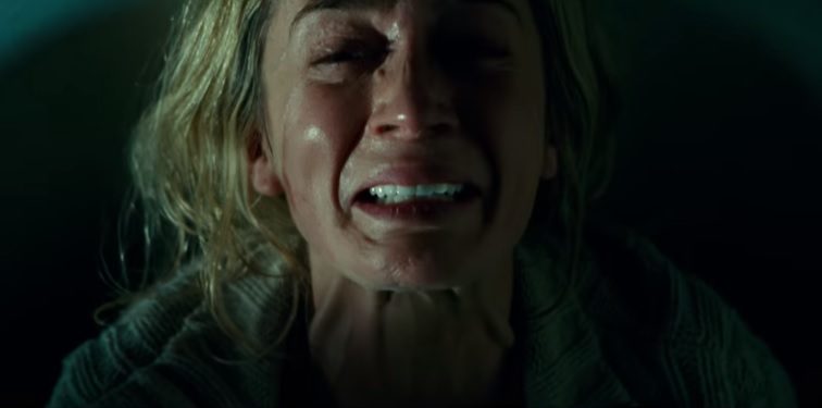 QUIET AND PAIN. Emily Blunt's character tries to keep from screaming as she gives birth to her baby.  