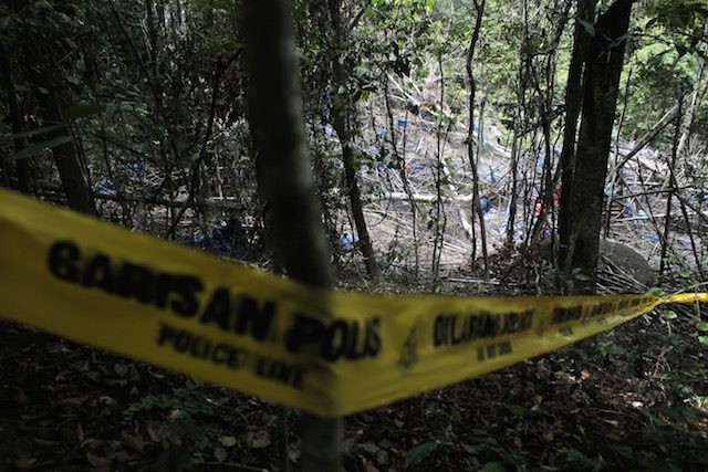 Malaysia believes 139 bodies in migrant graves