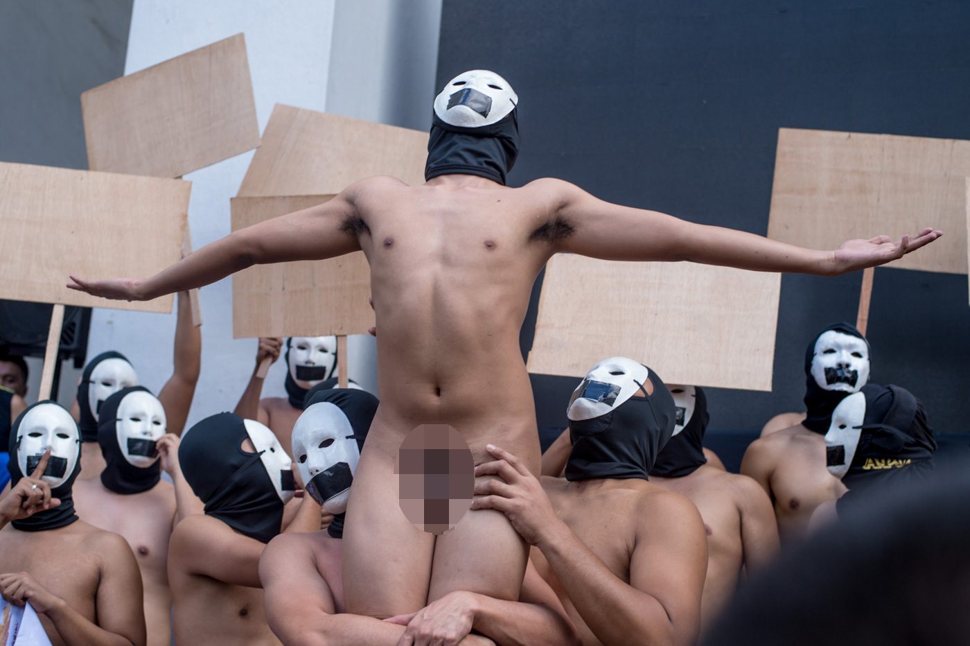 OBLATION. An Alpha Phi Omega (APO) fraternity member replicates UP's Oblation statue during the annual Oblation Run in the University of the Philippines Diliman on February 8, 2019. Photo by Lisa David/Rappler 