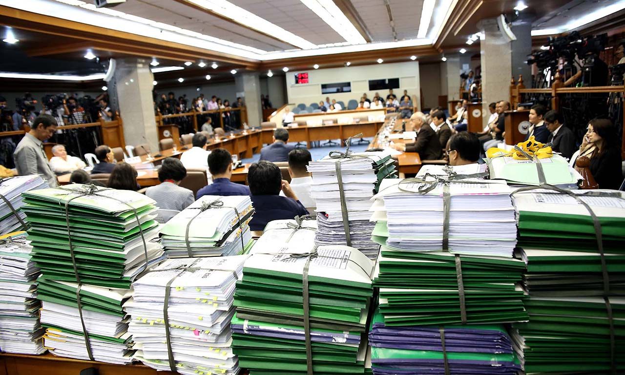 EVIDENCE AGAINST THE VICE PRESIDENT. The folders of evidence Trillanes referred during the January 26 Senate hearing. Photo by Alex Nuevaespaña/Senate PRIB 