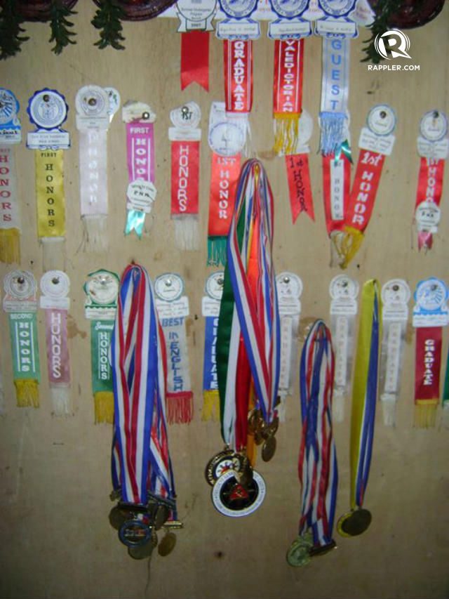 PROUD. In the Montoyas' home in Quezon hang the awards of all 9 siblings. Photo from Joyce Montoya