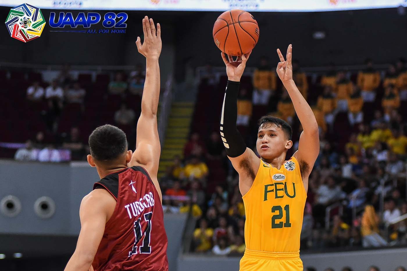 CLUTCH. Wendell Comboy's potential game-winning trey in regulation rims out  but the FEU veteran quickly redeems himself by  scoring 5 points in overtime, including the big fadeaway jumper that puts the Tams up with 18.3 ticks left. Photo release
   