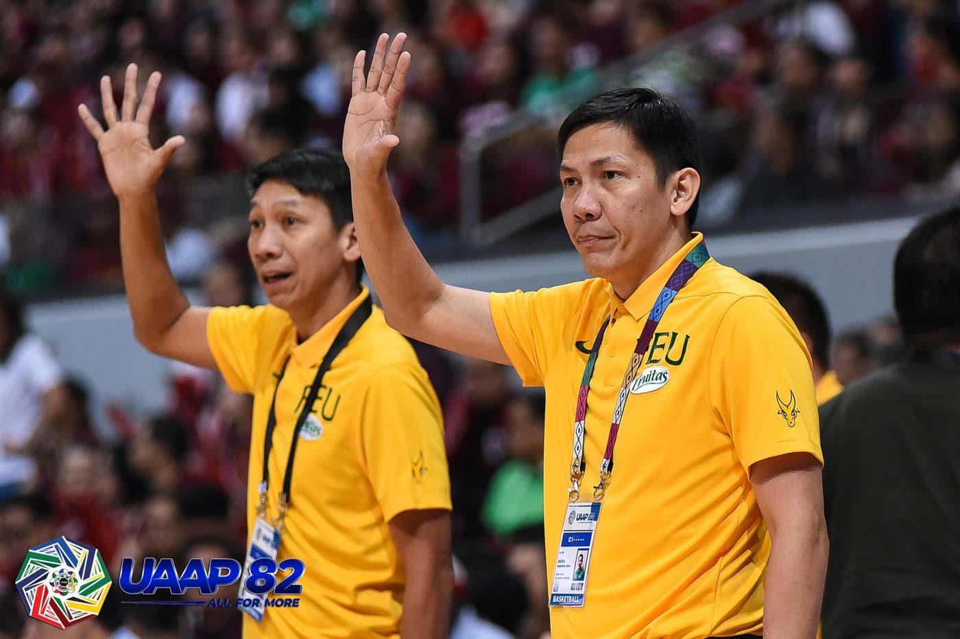 GRIT. 'Hard-fought win for us. That's what you expect every game in the UAAP,' says FEU coach Olsen Racela (right), who's assisted by his brother and former champion Tams coach Nash Racela. Photo release   