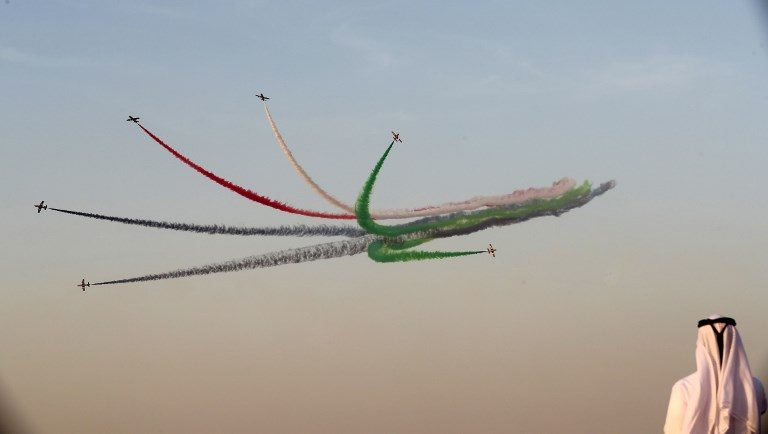 AIR SHOW. UAE's Al-Fursan display team performs at the Dubai Airshow on November 14, 2017. Photo by Karim Sahib/AFP  