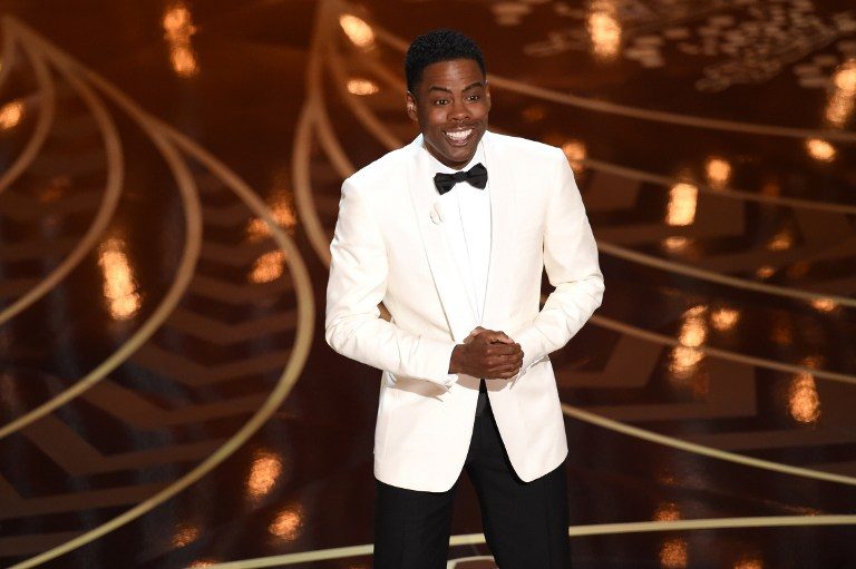 Chris Rock confronts race issue head-on at Oscars