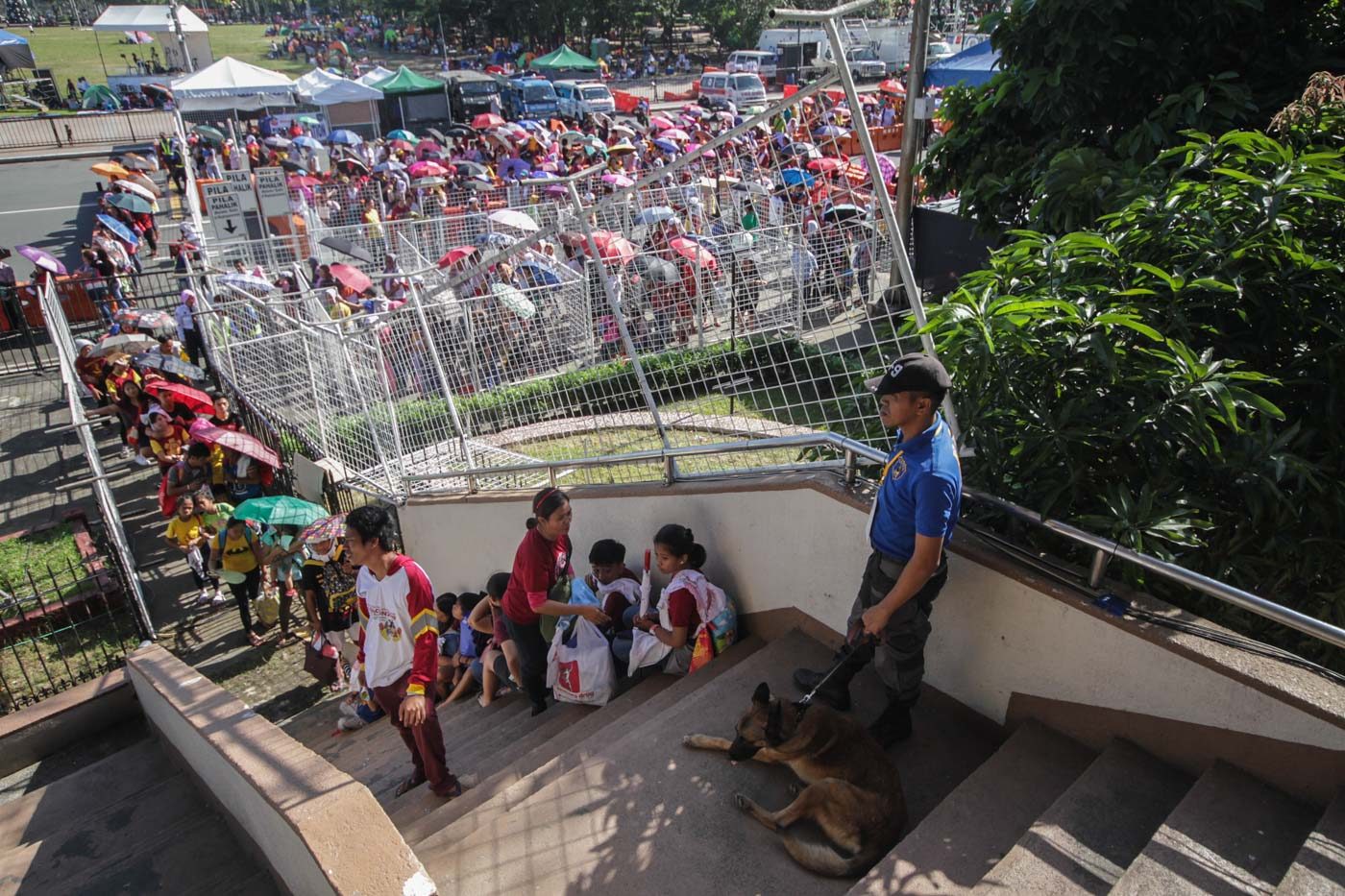LONG LINES. Devotees fall in line before signs like this on January 8, 2019, to join the traditional Pahalik ahead of the Feast of the Black Nazarene. Photo by Lito Borras/Rappler  