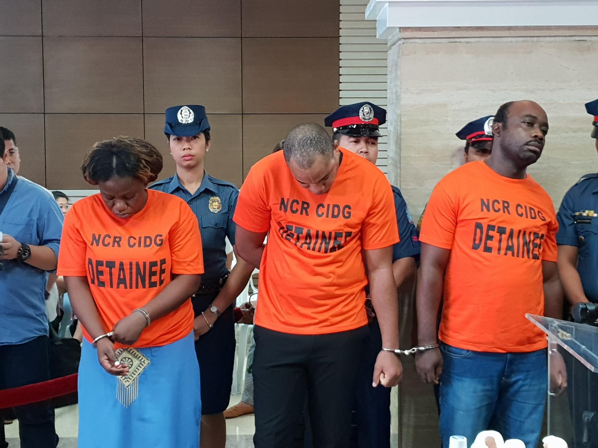 ARRESTED. The supposed members of an Angolan Budol-budol gang are presented in Camp Crame. Photo by Rambo Talabong/Rappler 