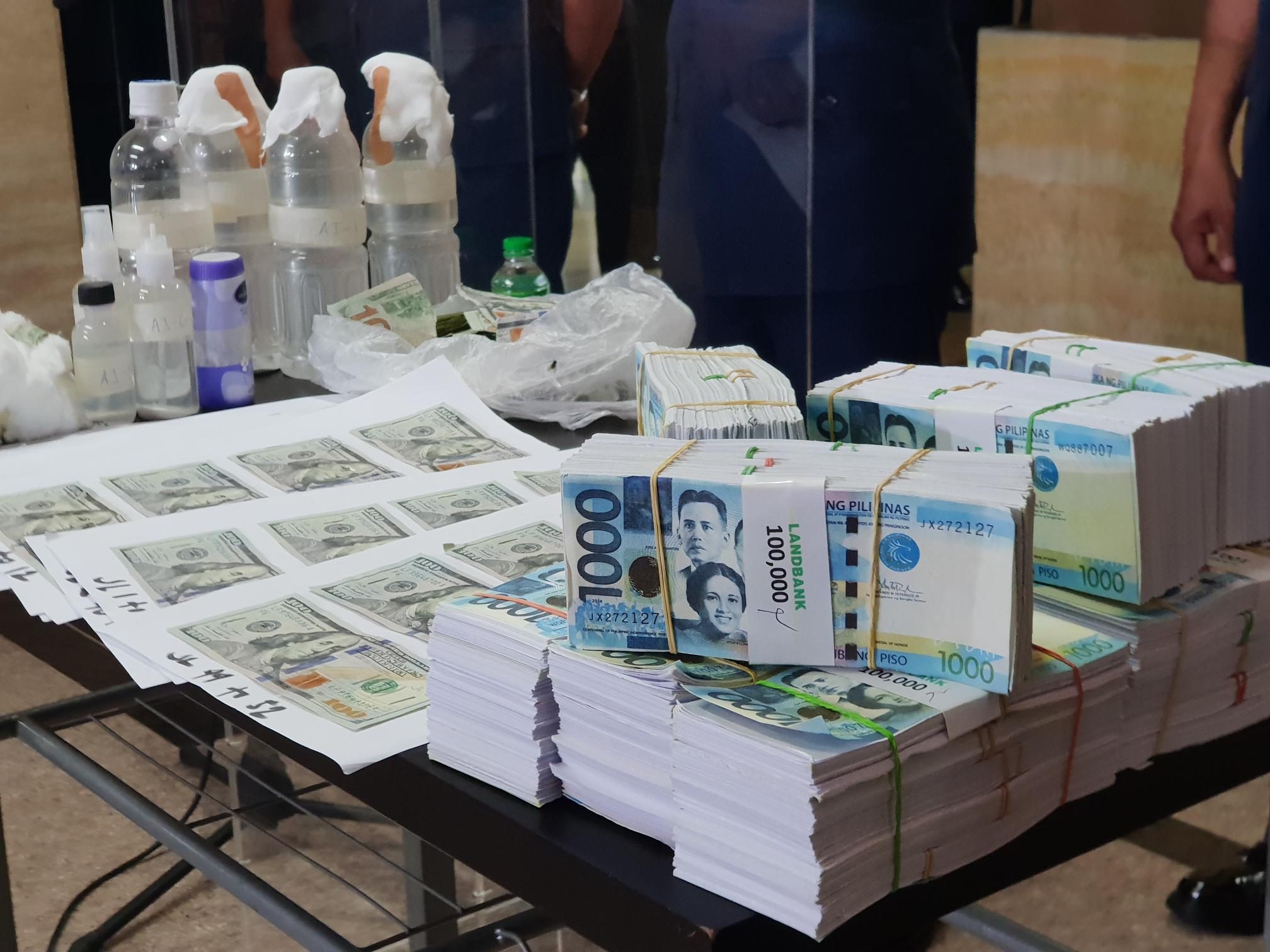 Scammers nabbed for selling liquid that turns peso bills into dollars