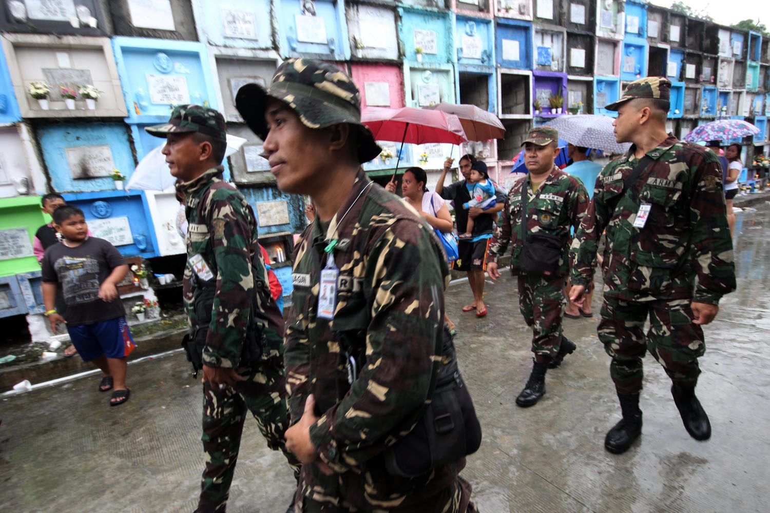 PHILIPPINE Army personnel help secure the Novaliches Public Cemetery. Photo by Darren Langit/Rappler
 